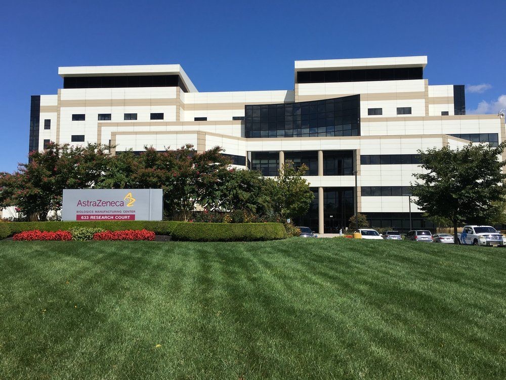 AstraZeneca Biologics Manufacturing Center in Frederick with its entrance sign.